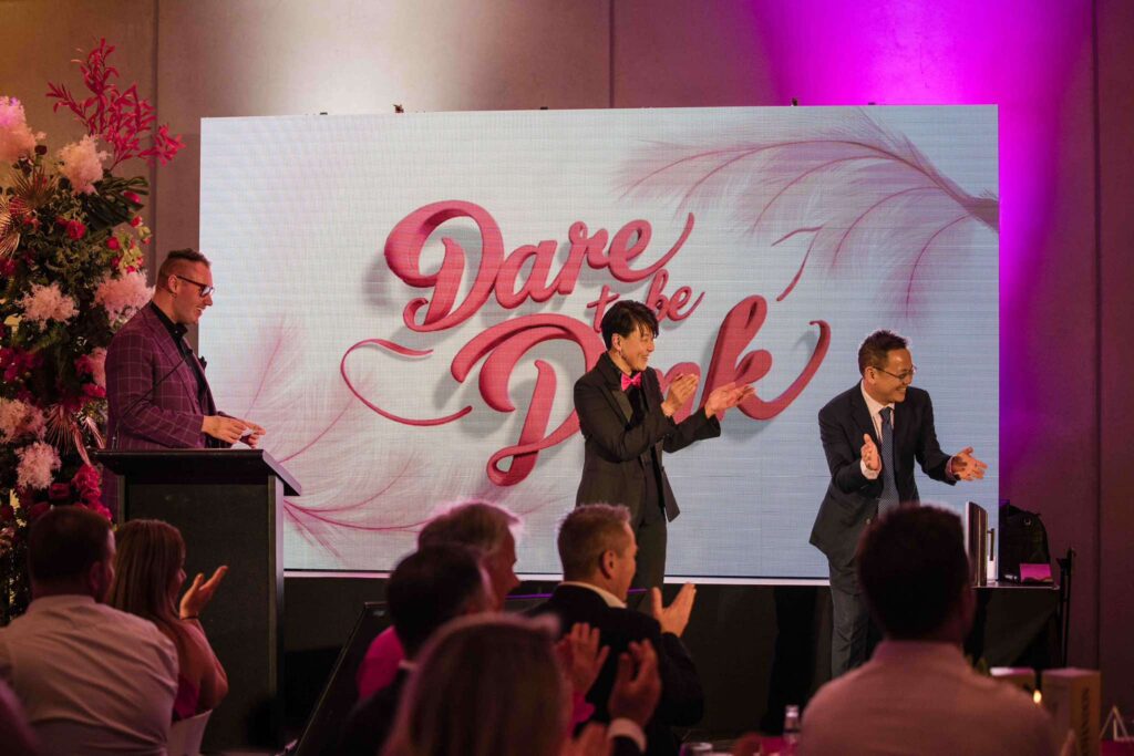 Brendan Dooley Comedy Magician + MC hosting an awards gala