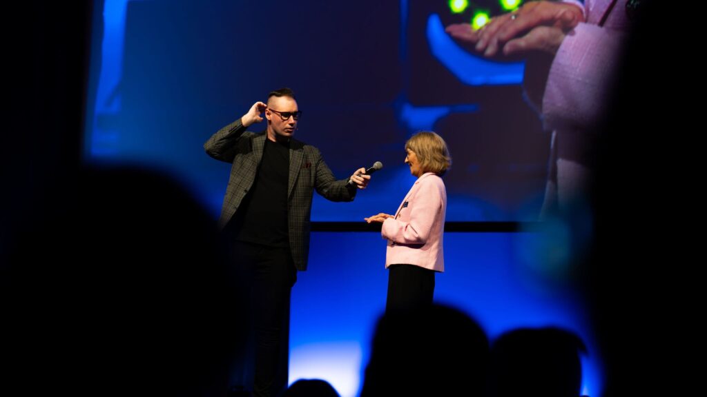 Brendan Dooley hosting a daytime conference  as MC