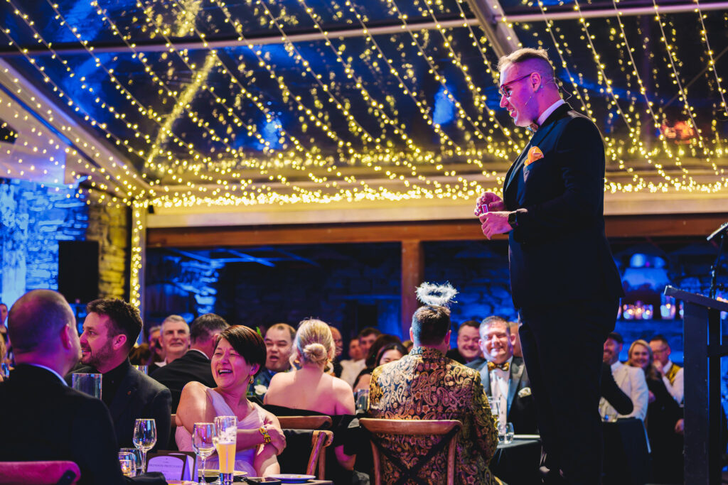 Comedy magician and MC Brendan Dooley performing at a Queenstown conference gala