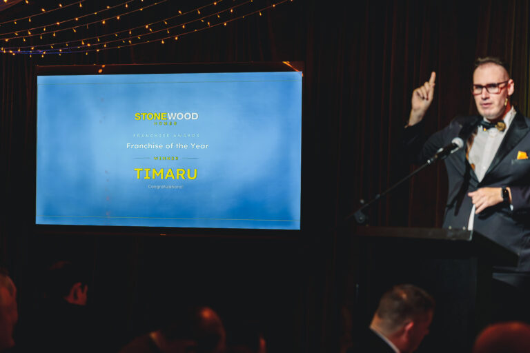 Brendan Dooley announcing the Franchise of the Year award at the Stonewood Homes gala in Queenstown